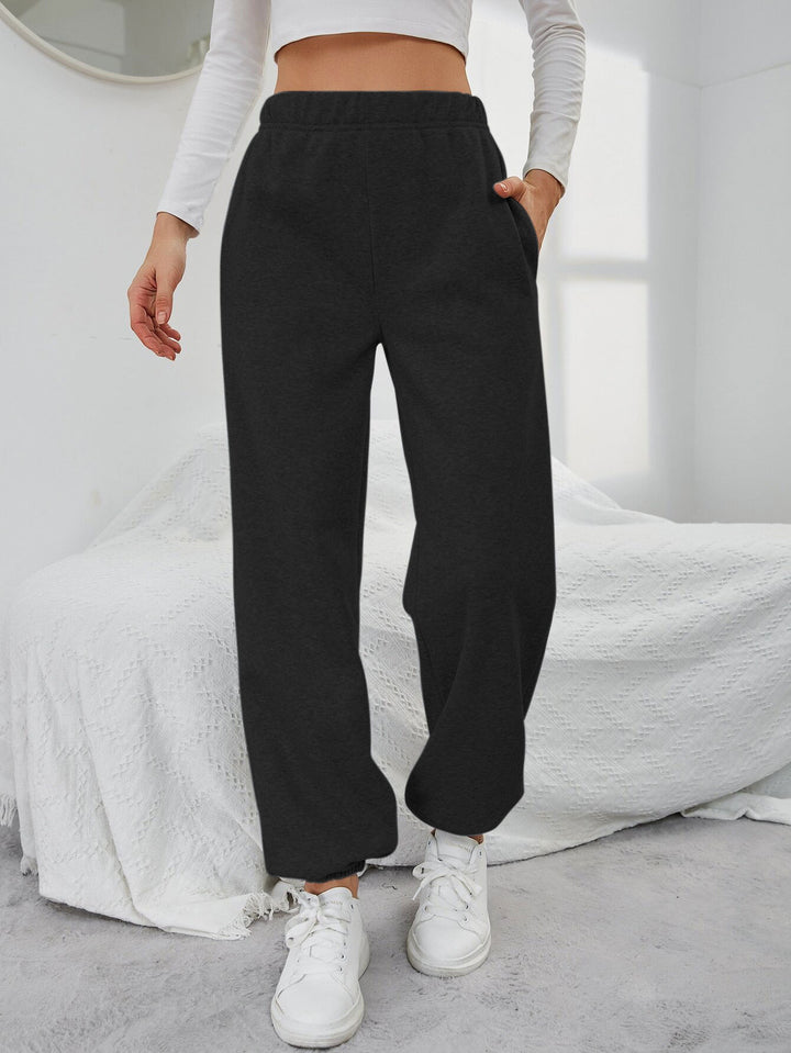 Pantalons de survêtement décontractés pour femmes avec taille élastique et poches latérales Chic & Stil