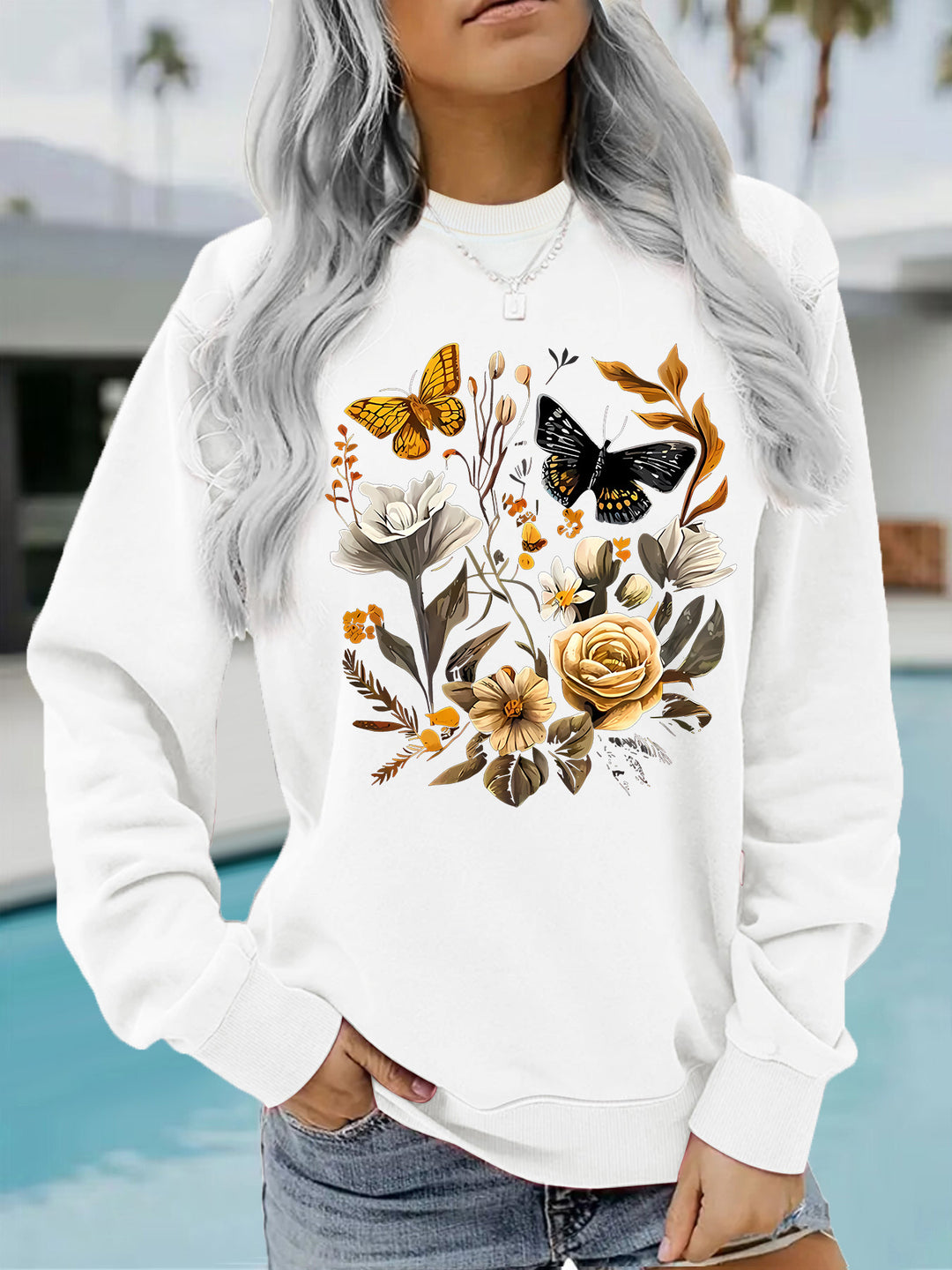 Sweat-shirt femme avec imprimé floral et coupe décontractée Chic & Stil