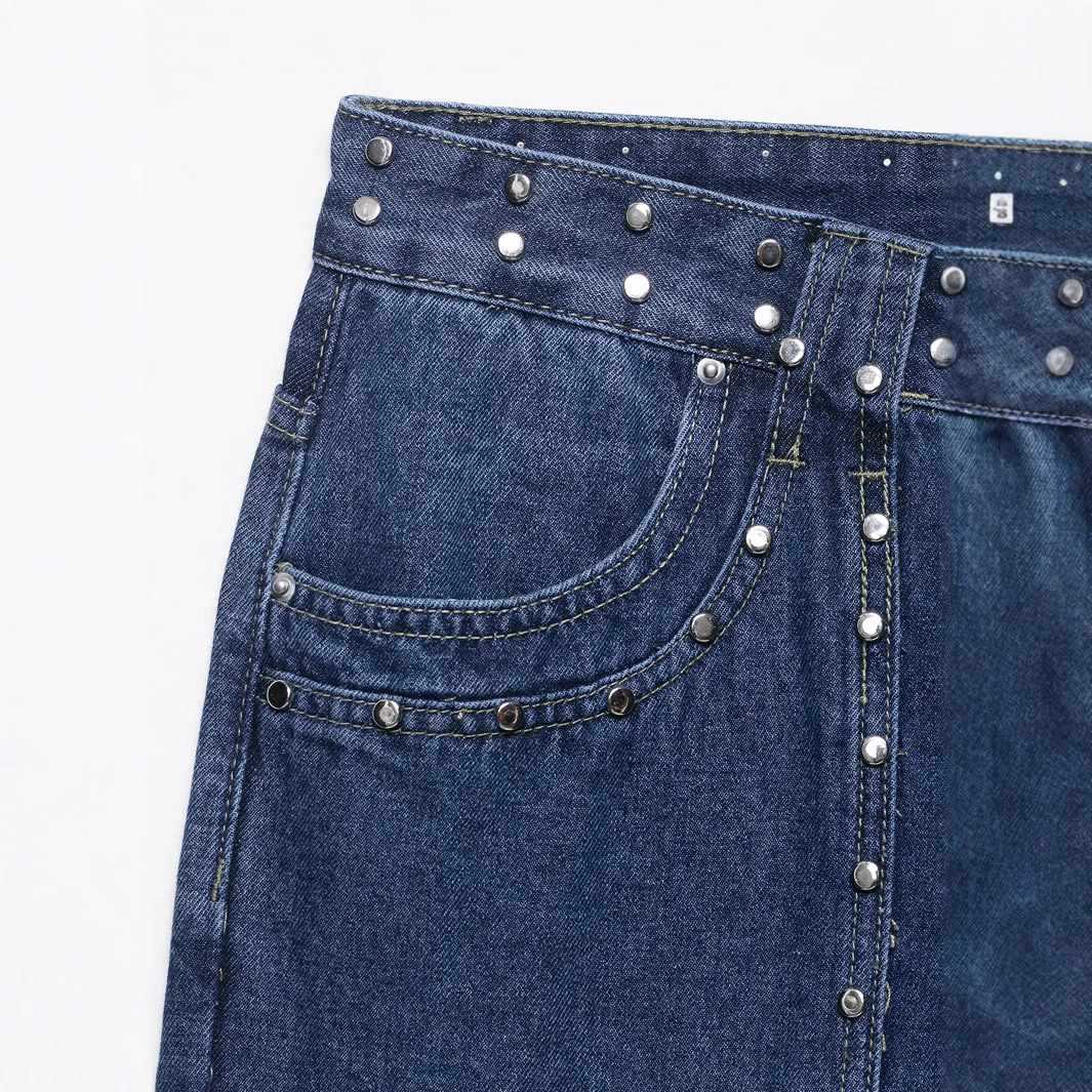 Flared women's jeans with floral embroidery and decorative button details Lune London