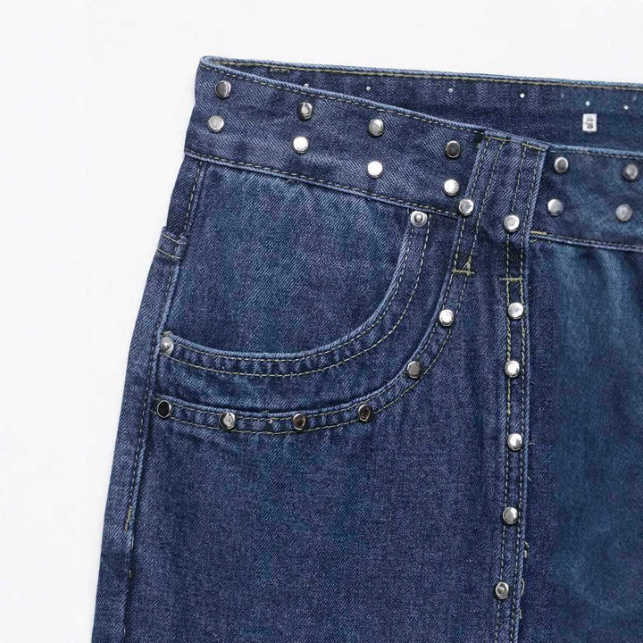 Flared women's jeans with floral embroidery and decorative button details Lune London