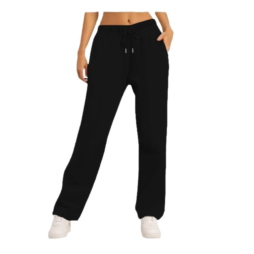 Women's comfortable casual pants with elastic waistband and practical side pockets Chic & Stil