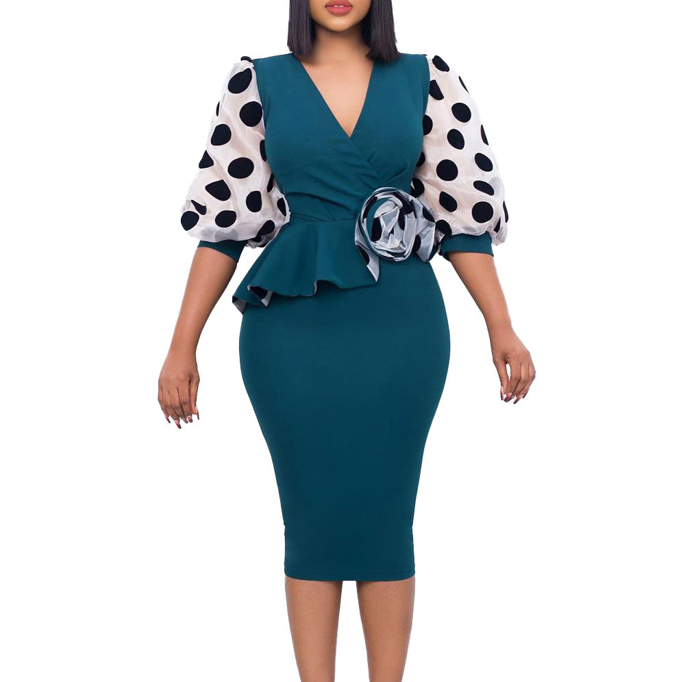 Fitted cocktail dress for women with sheer puff sleeves and floral accent Lune London