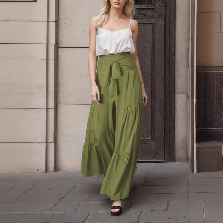 High-waisted wide trousers for women with elegant pleats and a tie belt Lune London