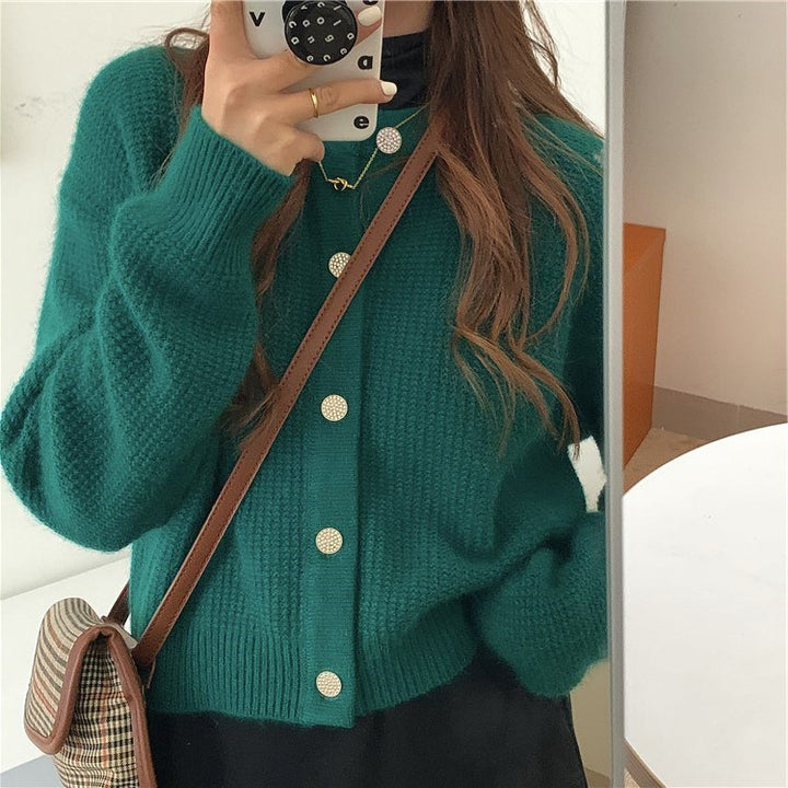 Cardigan pour femmes avec des détails de bouton sophistiqués et une coupe large Chic & Stil