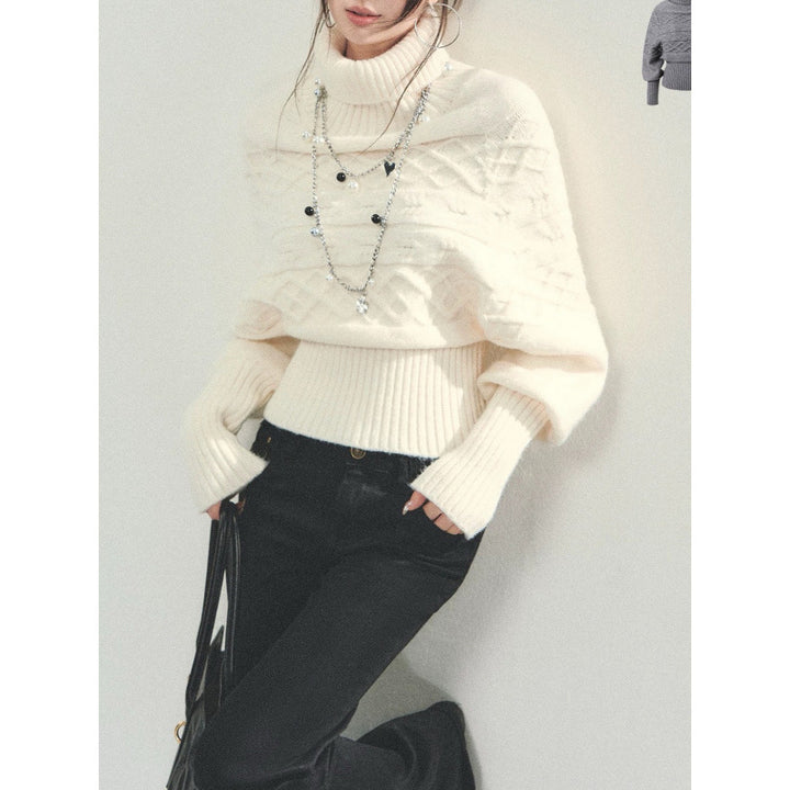 Pull en tricot pour femmes avec coupe oversized et col roulé Chic & Stil