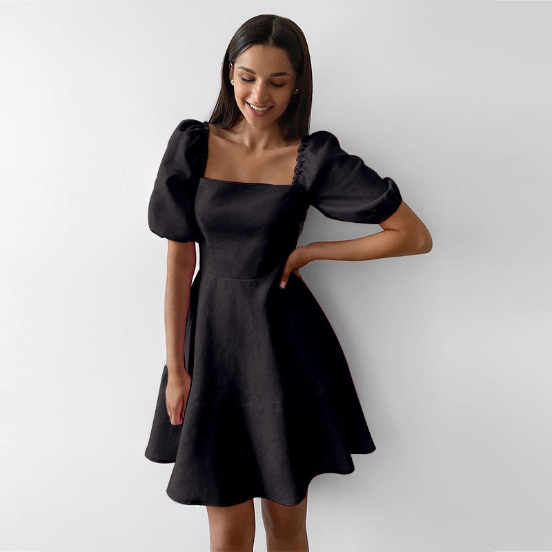 Women's Playful Dress with Generous Puff Sleeves and Swinging Hem Lune London