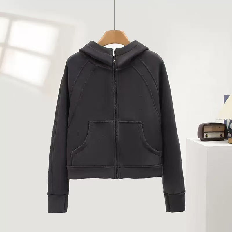 Veste à capuche confortable pour femme avec col montant et poches pratiques Chic & Stil