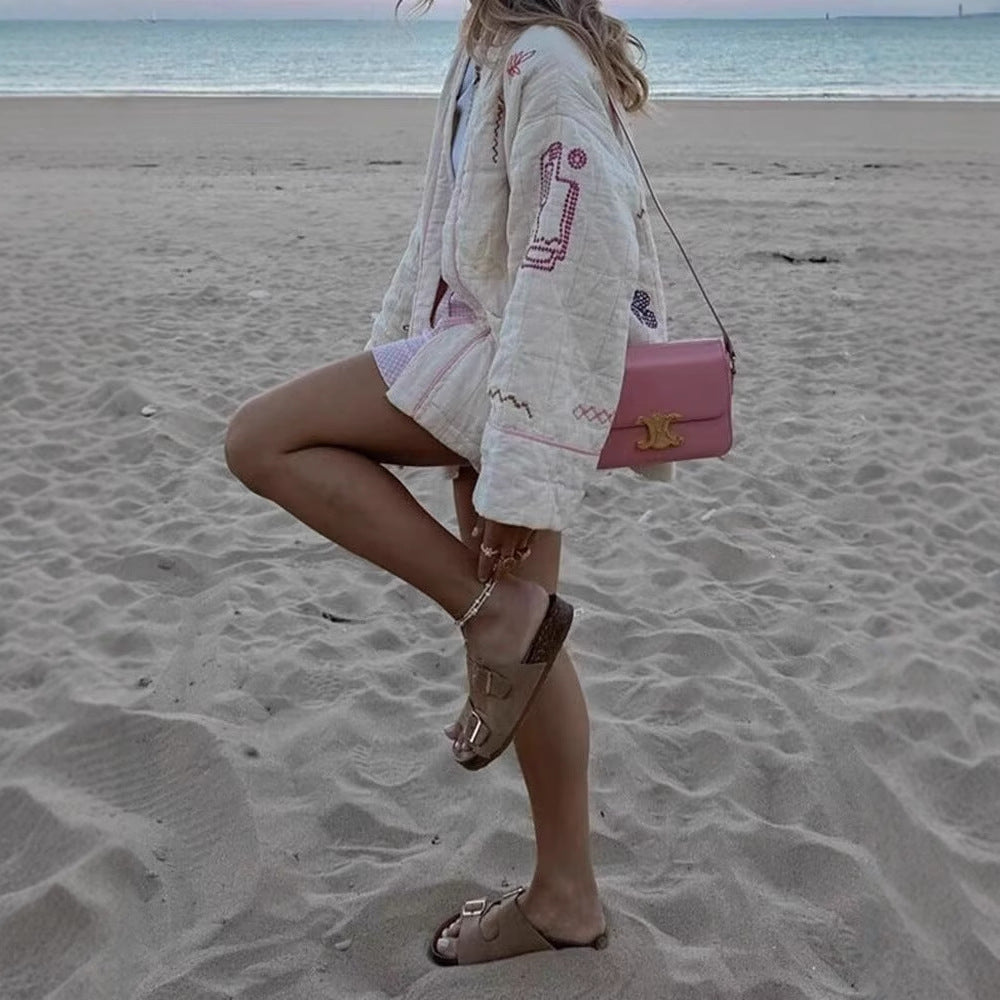 Women's kimono jacket with decorative embroidery design and practical pockets Lune London