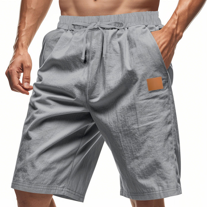 Casual men's sports shorts with elastic waistband and practical pockets Lune London