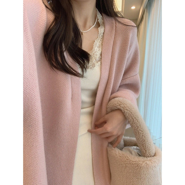 Manteau long en tricot pour femmes avec une coupe surdimensionnée et une doublure en polaire douce