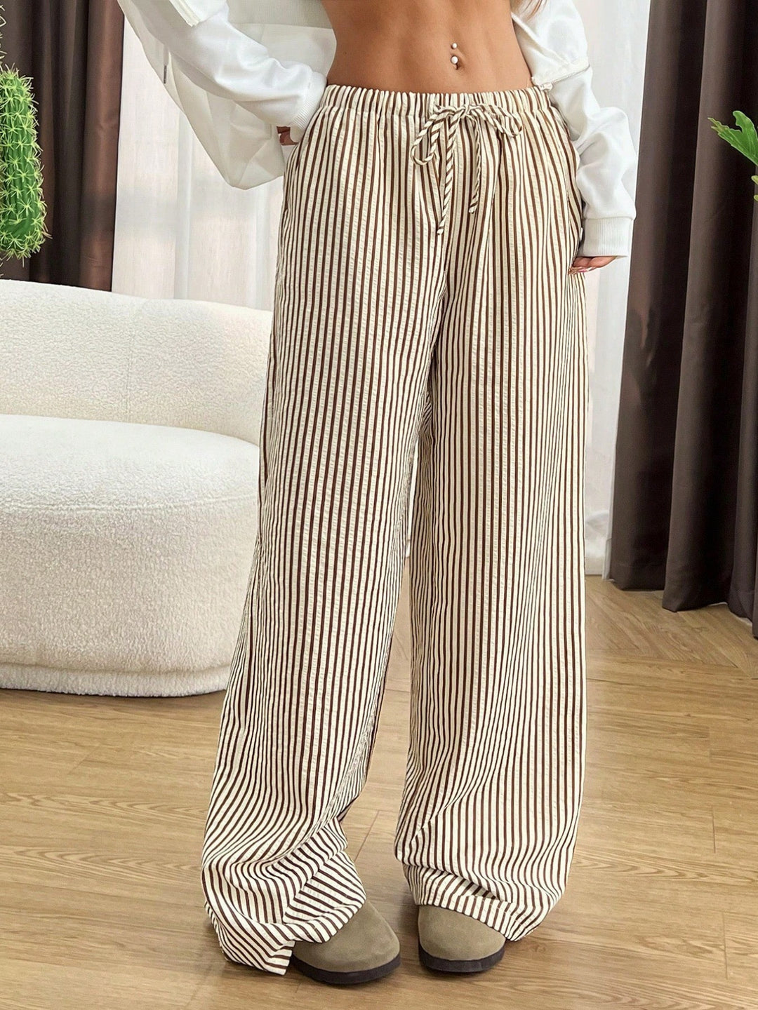 Elegant wide knit trousers for women with discreet striped pattern Lune London
