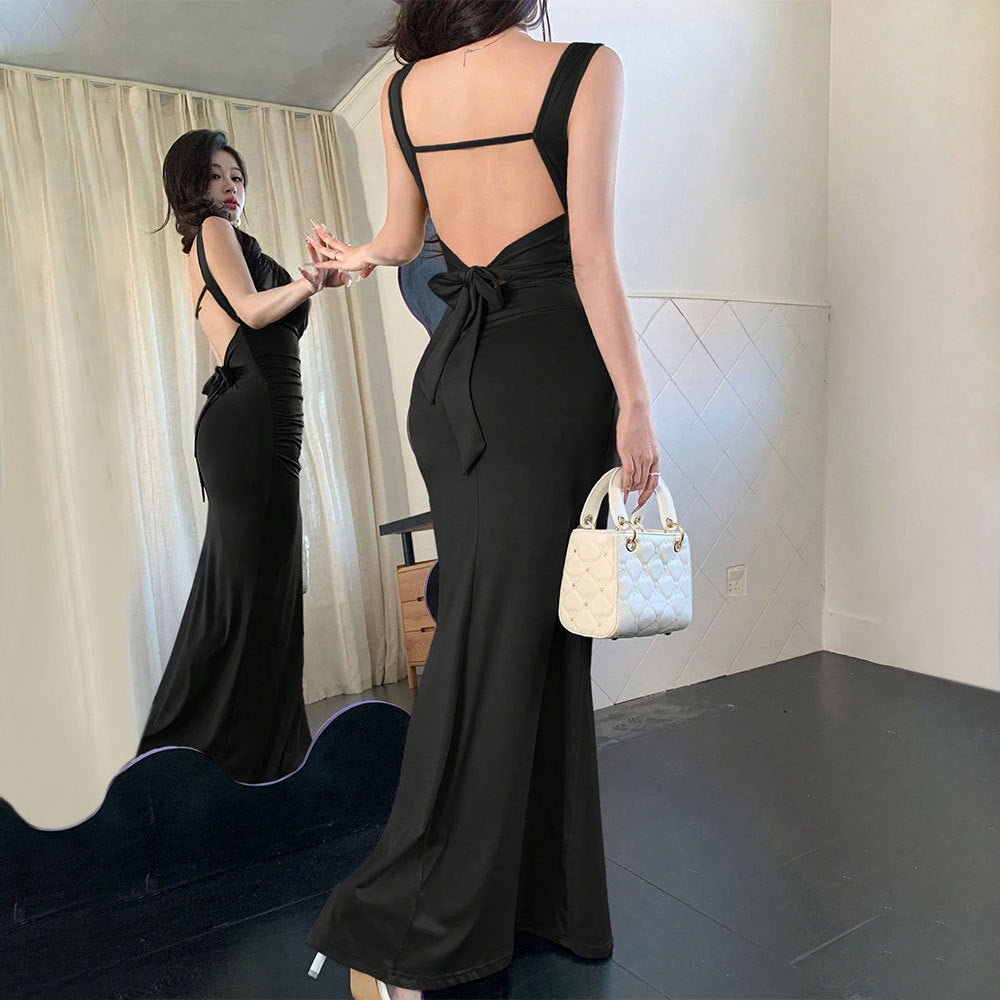 Elegant evening dress for women with refined back cutouts and decorative tie belt Chic & Stil