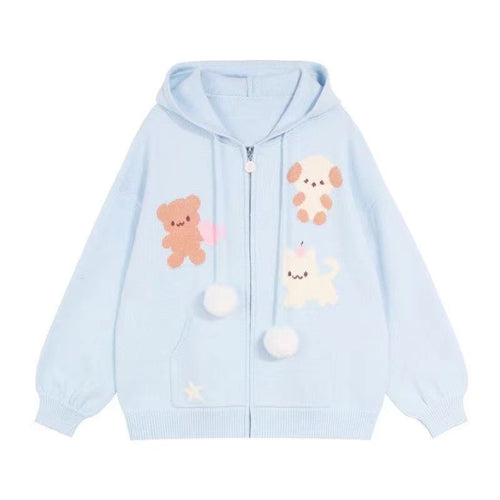 Hooded jacket for ladies with playful animal patterns and pom poms Lune London