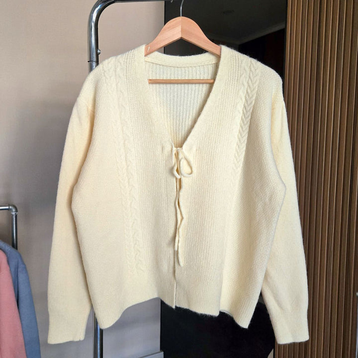 Women’s knit jacket with cable pattern and decorative drawstring Lune London