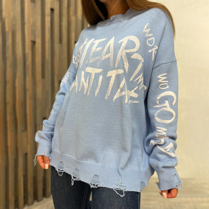 Oversized sweatshirt for women with creative inscription and trendy ripped details Lune London