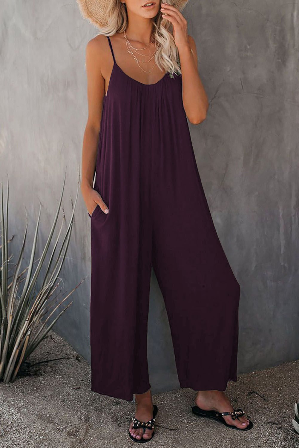 Casual summer jumpsuit for women with plunging neckline and practical pockets Lune London