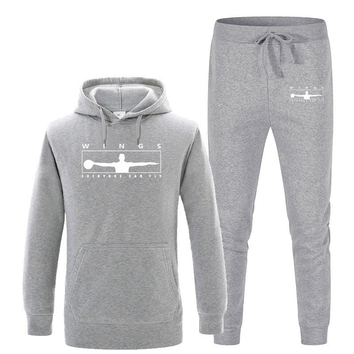 Women's jogging suit with modern logo and comfortable kangaroo pockets Chic & Stil