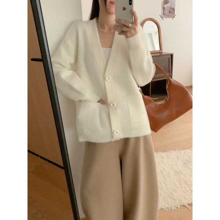 Cardigan pelucheux à boutons pour femmes avec poches élégantes Chic & Stil