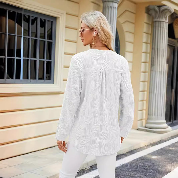 Ladies Elegant Long Sleeve Blouse with Fine Ribbed Structure and Chic Side Slits and Style