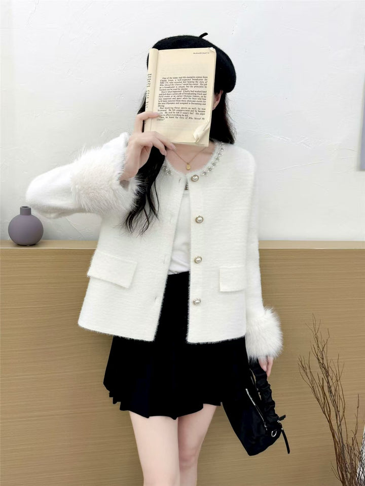 Cardigan élégant pour femmes avec décoration de perles et manches duveteuses Chic & Stil