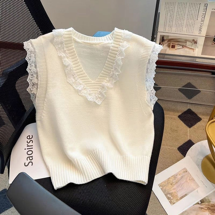 Women’s knit top with delicate lace sleeves and V-neck Lune London