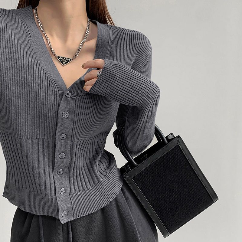 Women fitted cardigan with V-neck and button placket Lune London