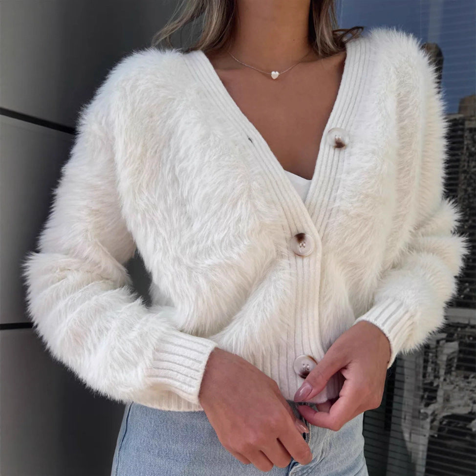 Ladies cozy cardigan with a plush texture and chic button details