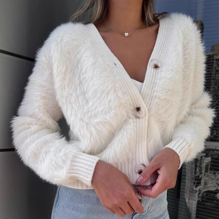 Ladies cozy cardigan with a plush texture and chic button details