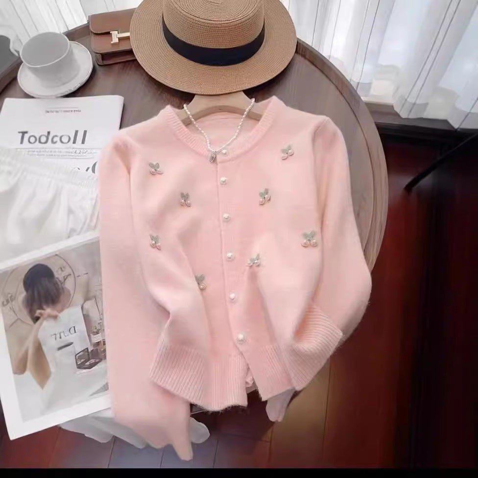 Ladies Elegant Knitted Waistcoat with Chic Floral Applications and Style