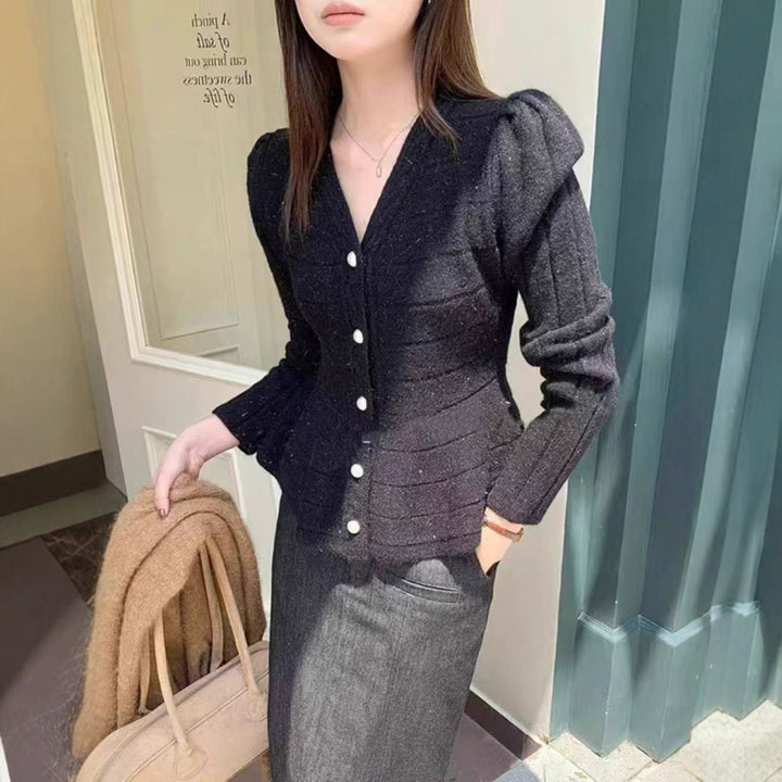 Ladies elegant cardigan with textured design and feminine puff sleeves Lune London