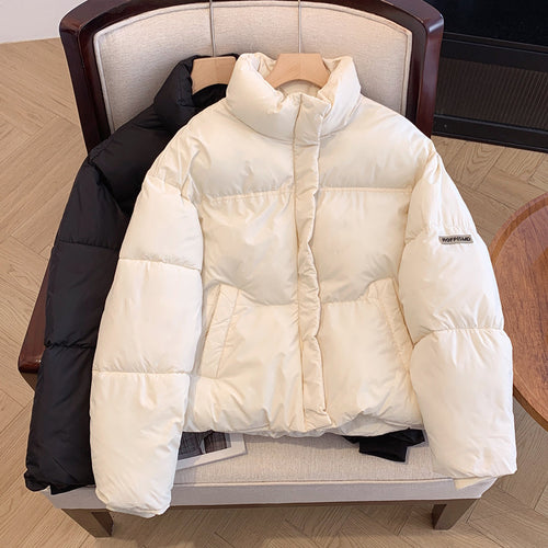 Short Puffer jacket for women with high collar and practical pockets Lune London
