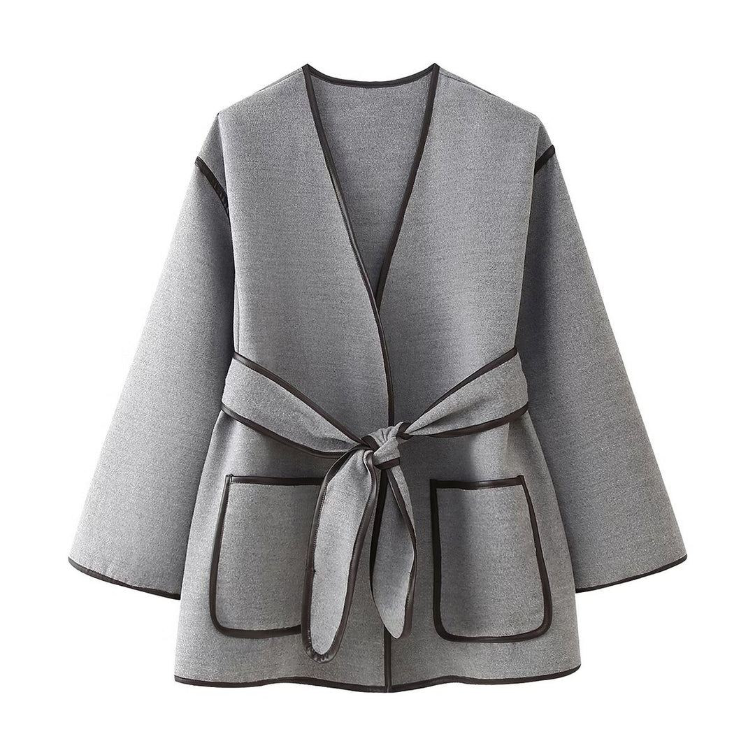 Wrap jacket for women with a modern design featuring practical pockets and a tie belt Lune London