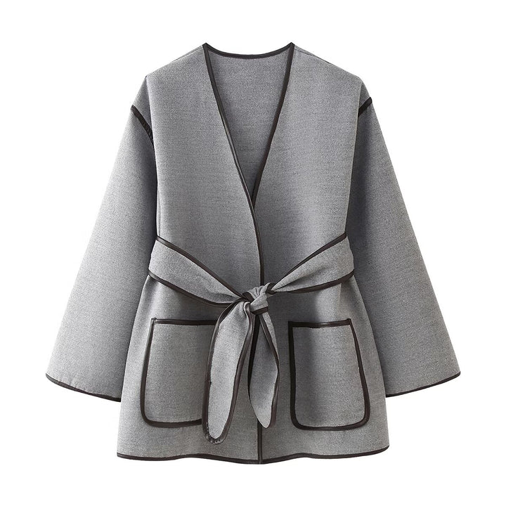 Wrap jacket for women with a modern design featuring practical pockets and a tie belt Lune London
