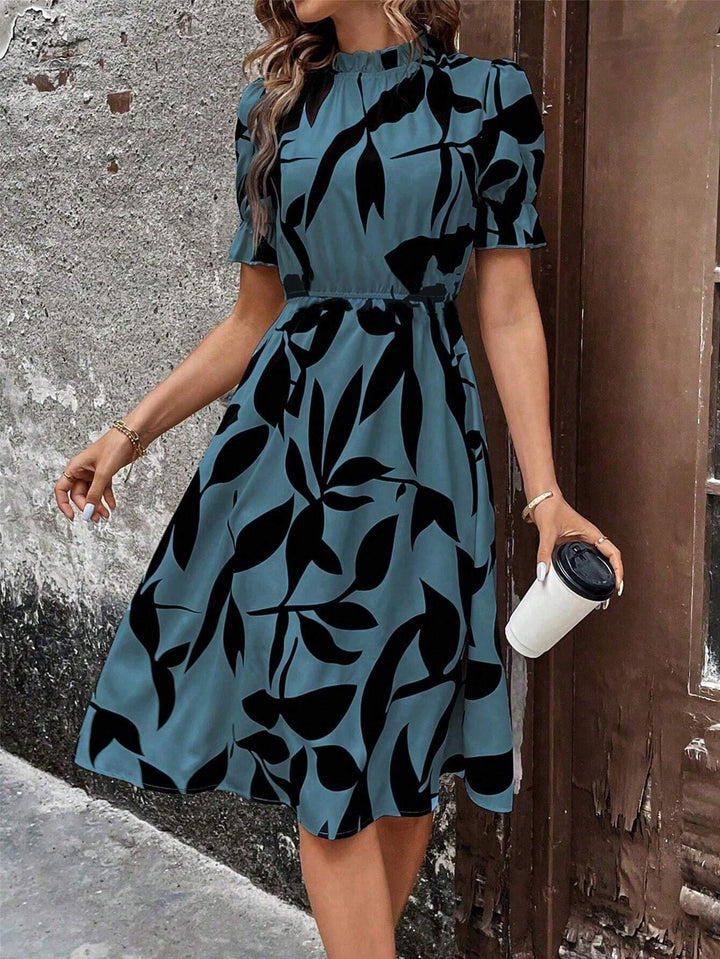 Robe midi élégante pour femmes avec motif de plantes stylé et taille élastique Chic & Stil