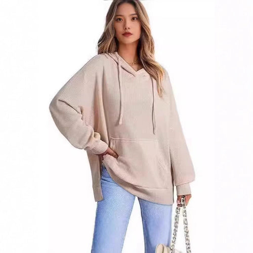 Oversized women's hoodie with side slits and practical pockets Lune London