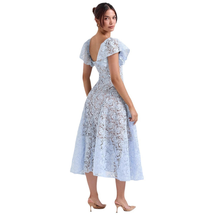 Maxi lace dress for women with voluminous ruffles and a subtle heart-shaped neckline Chic & Stil