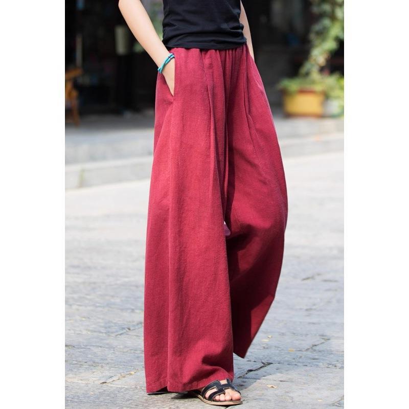 Linen trousers for women in loose fit with elastic waistband and practical pockets Lune London
