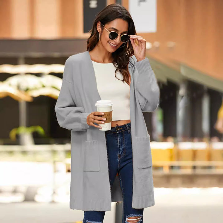 Knit coat for women with oversized and comfortable sleeves and practical pockets Lune London
