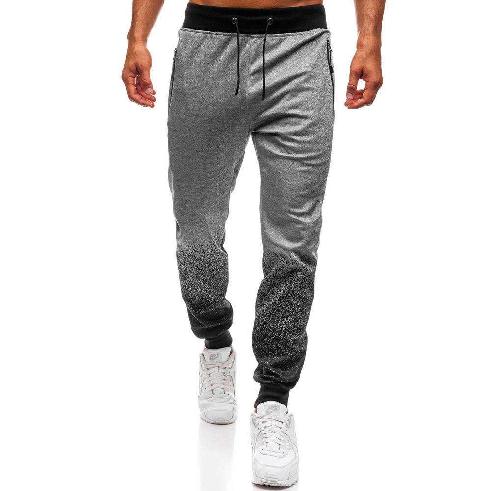 Men's sporty jogger pants with refined color gradient and practical zippered pockets Lune London