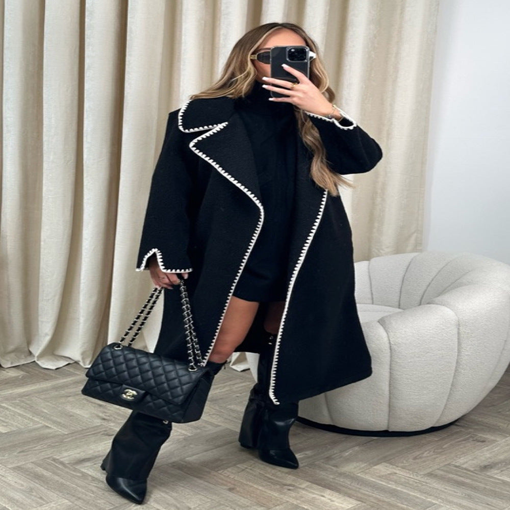 Elegant coat for women with a stylish clutch collar and contrasting decorative seams Lune London