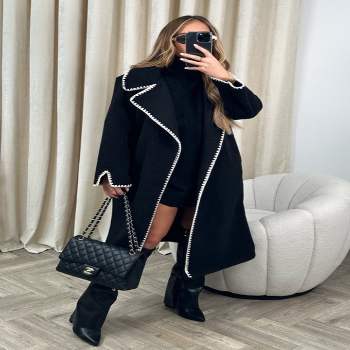 Elegant coat for women with a stylish clutch collar and contrasting decorative seams Lune London