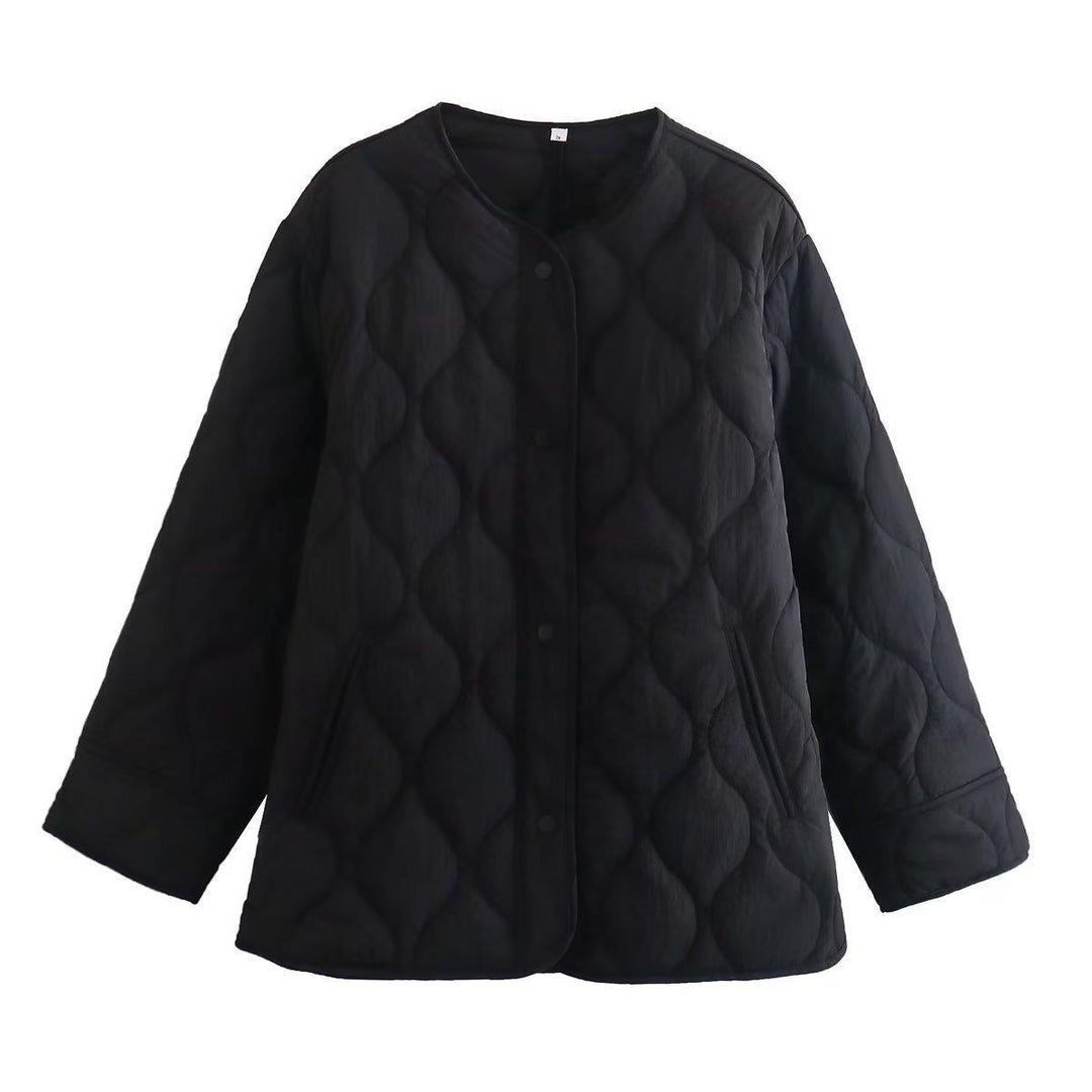 Quilted transition jacket for women with practical button closure and warm inner lining Lune London