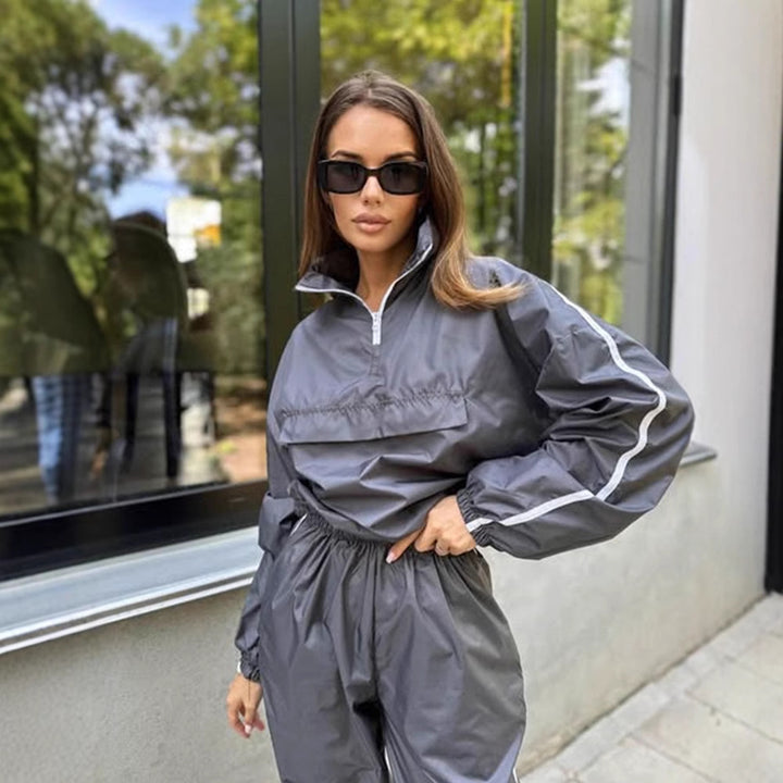 Ladies functional sports suit with high collar and elastic cuffs Lune London