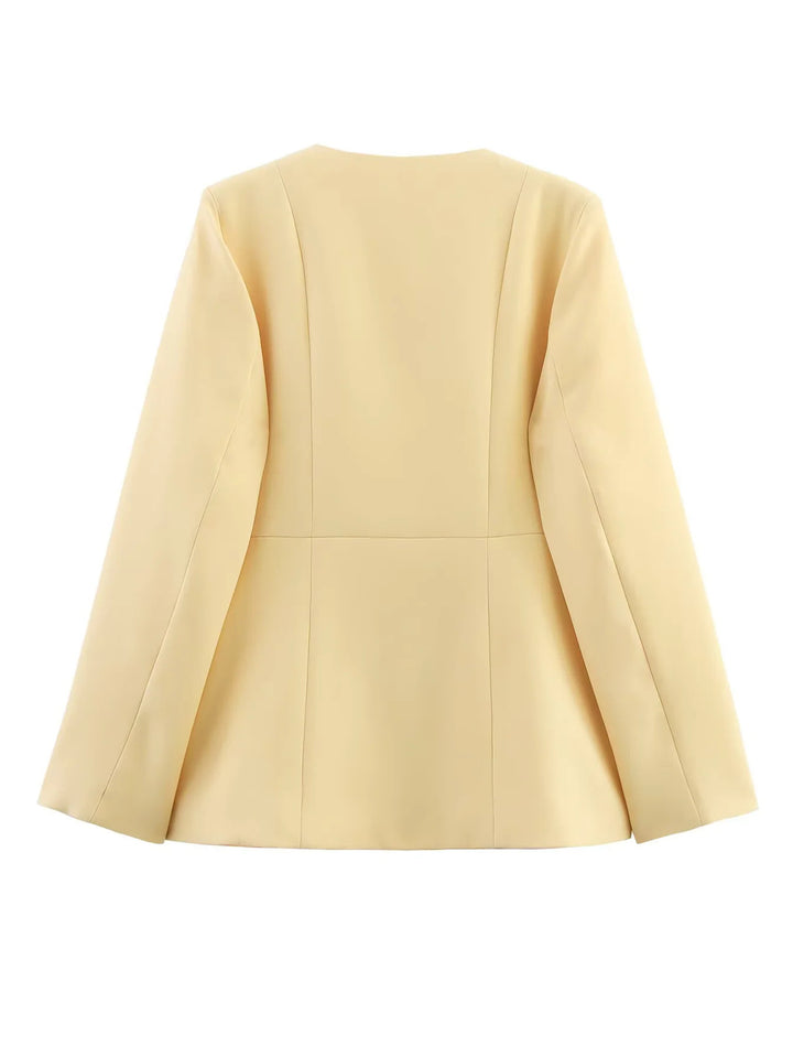Elegant short blazer for women with a tailored fit and chic button details.