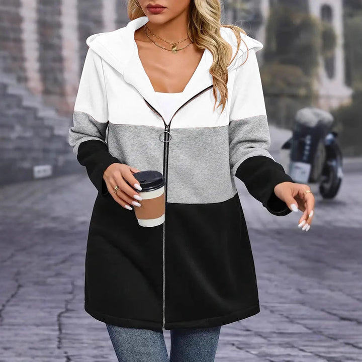 Trendy long hooded jacket for women with chic and stylish color block design