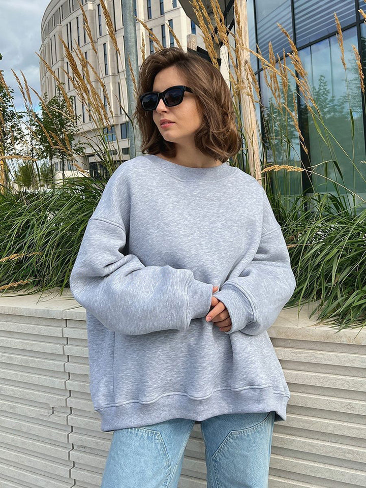 Woman Oversized sweatshirt with a relaxed fit and modern chic accents and style
