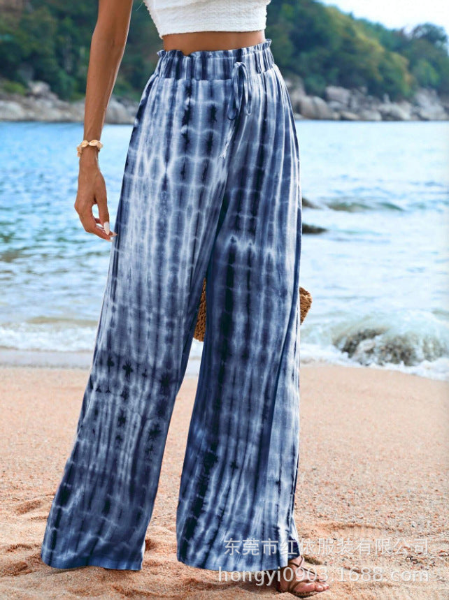 Pantalon d'été ample pour femmes avec taille élastique et motif batik unique Chic & Stil
