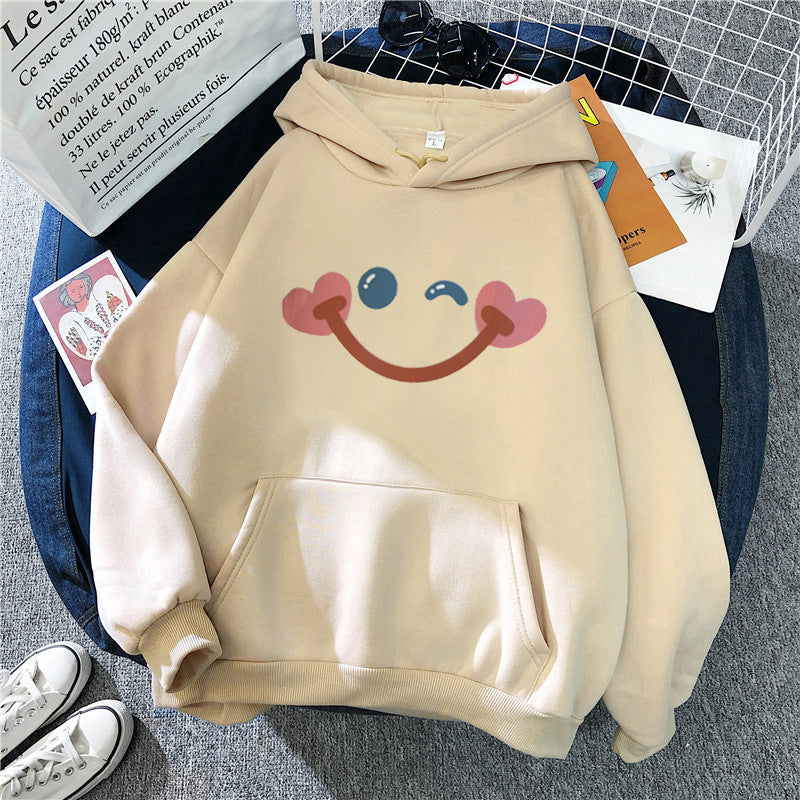 Women's hoodie with cheerful smiley design Chic & Stil