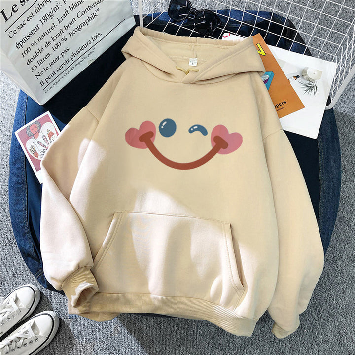 Women's hoodie with cheerful smiley design Chic & Stil
