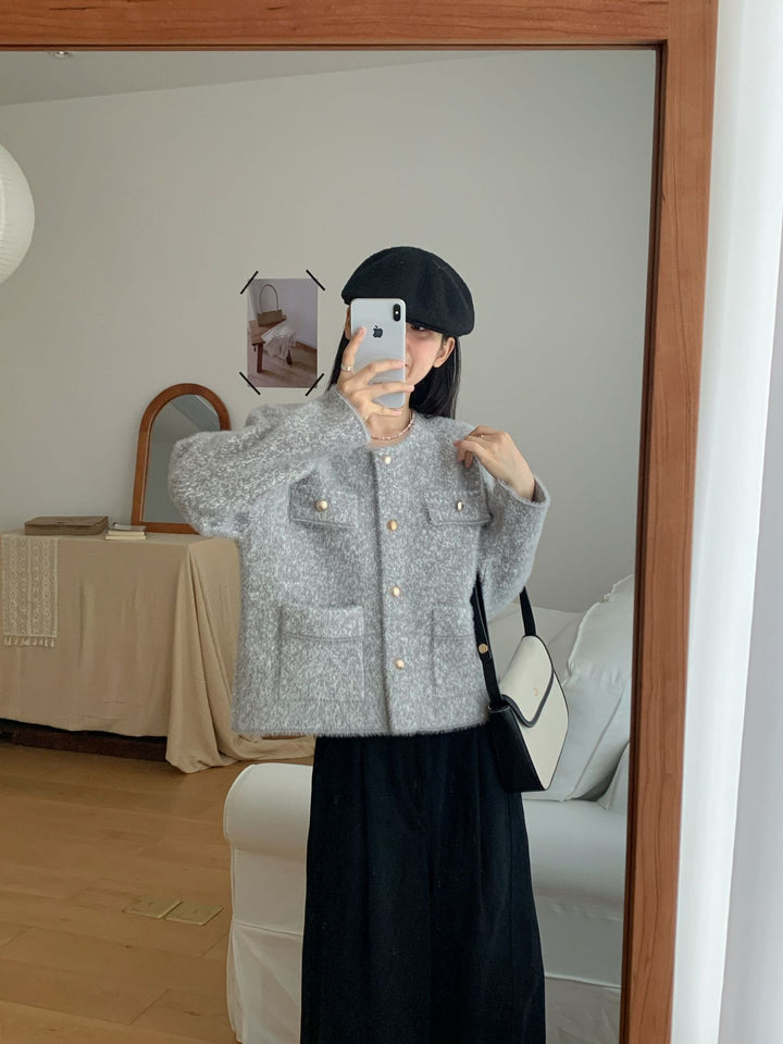 Veste en tricot confortable pour femmes avec détails en bouton et poches plaquées Chic & Stil
